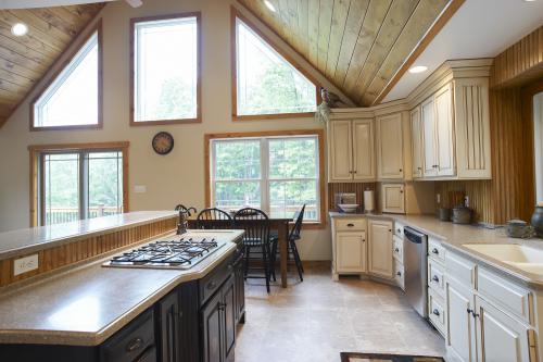 Country kitchen cabinets and island